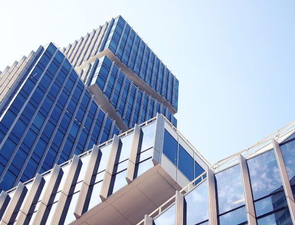 Modern glass-clad commercial building of the kind H & R Contracting services